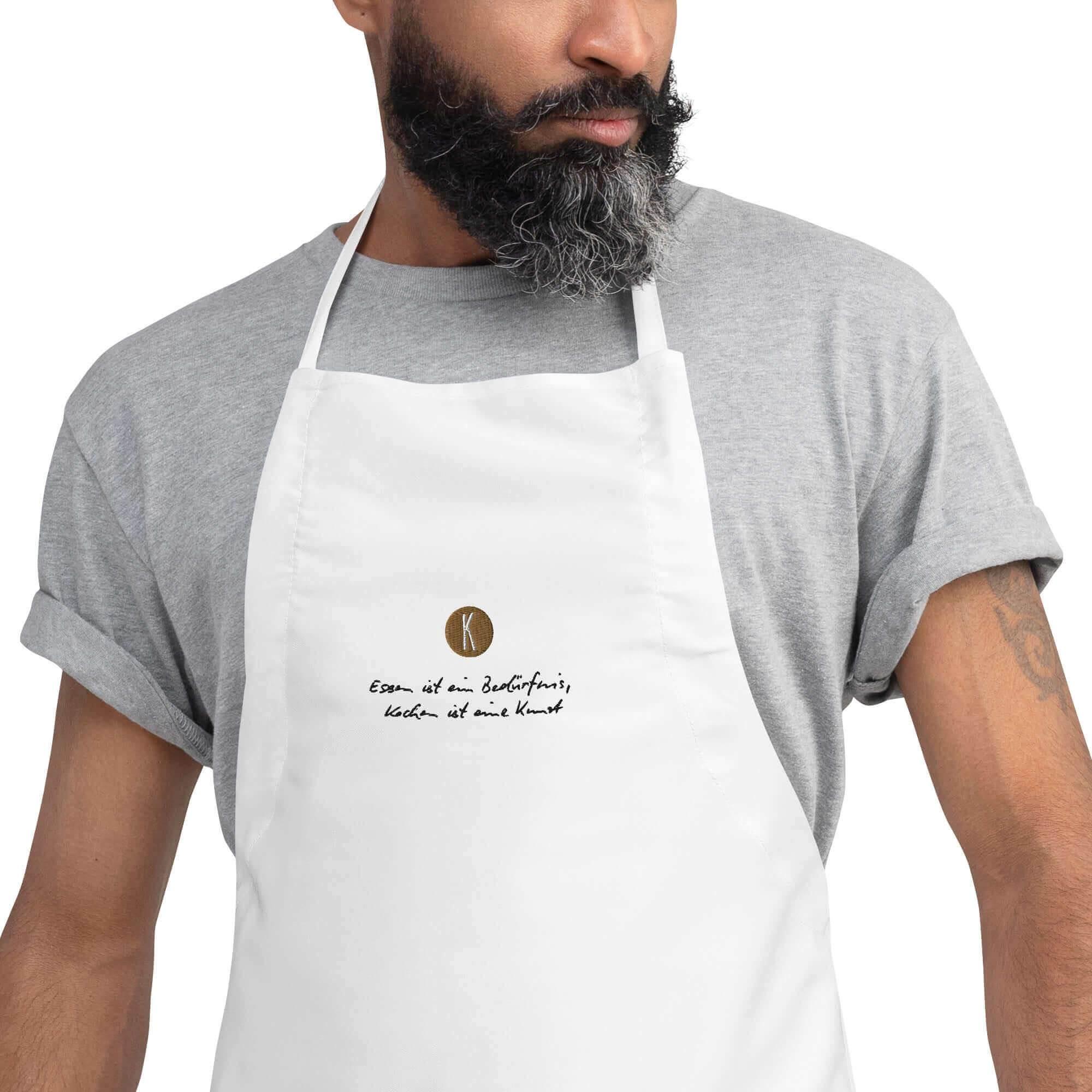 Weiße Kochschürze bestickt | Unisex - Kochen ist eine Kunst - Kochschein